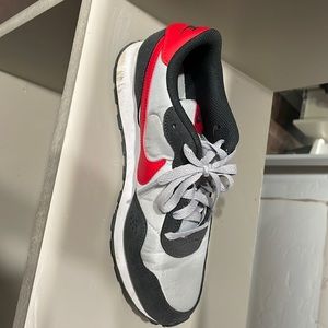Black and Red Nike shoes 6 youth